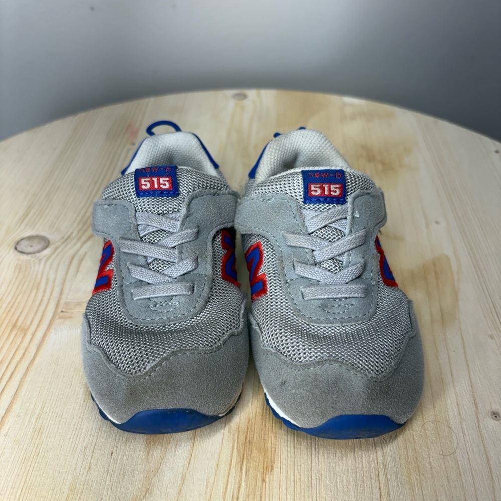 New Balance Kids' Gray Sneakers with Blue and Red Accents
